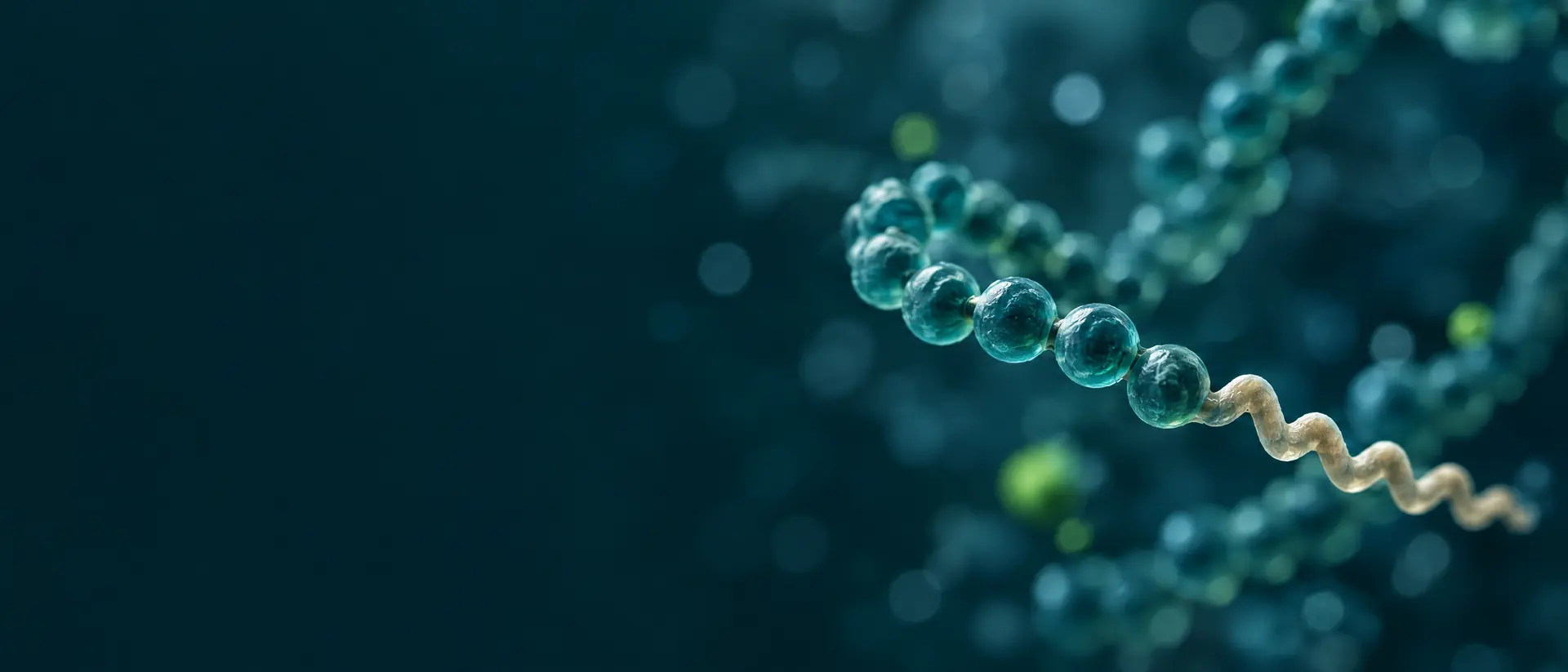 Abstract teal bead-chain molecule with a pale tail floating among soft circular bokeh
