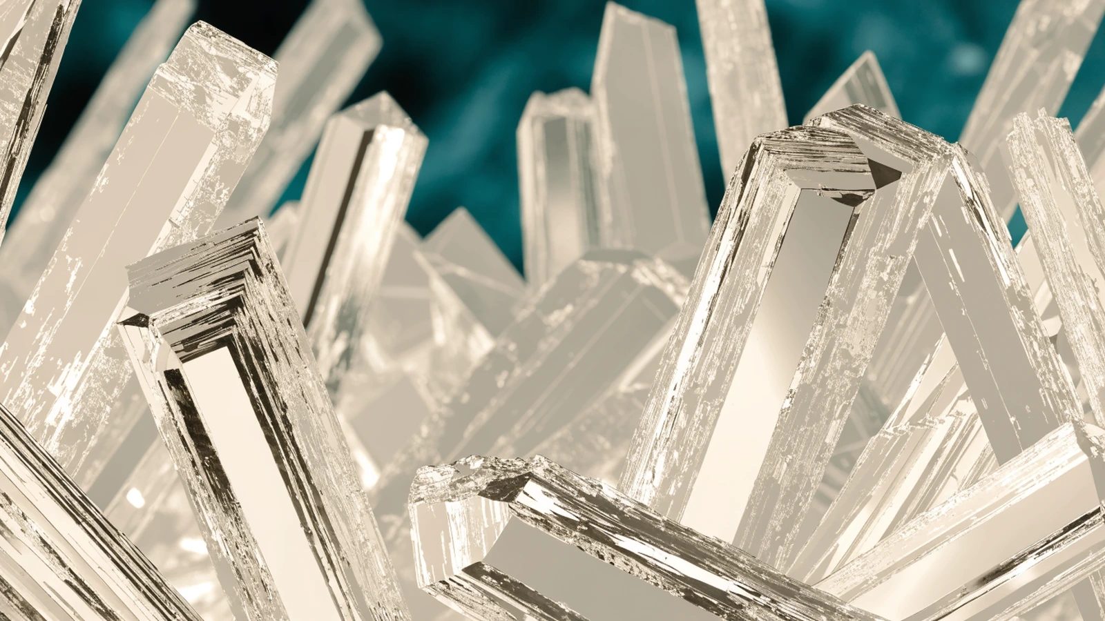 A decorative microscopic-texture image showing faceted prismatic crystals.